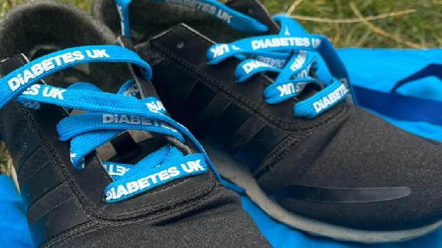 Pair of trainers with Diabetes UK branded shoelaces