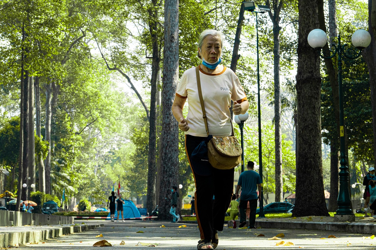 Female senior citizen walking in a park