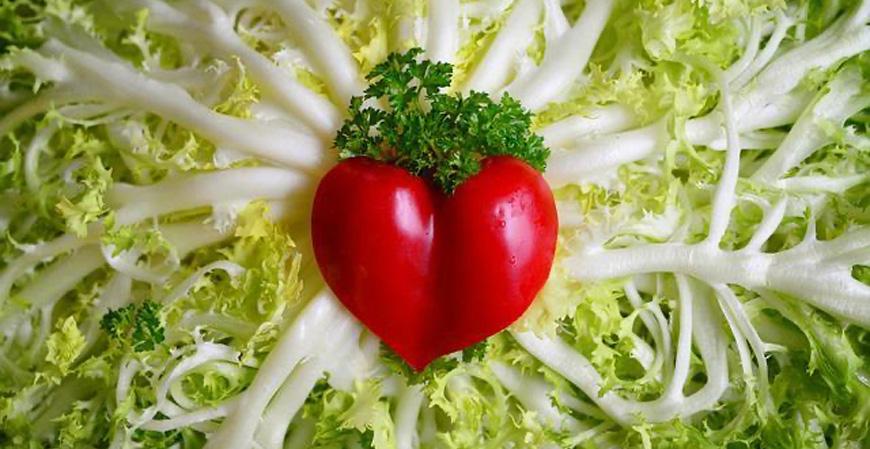 Leafy vegetable with veggie "heart" in center