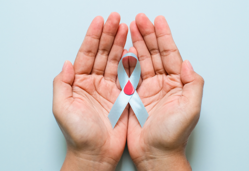 Pair of hands holding Diabetes ribbon