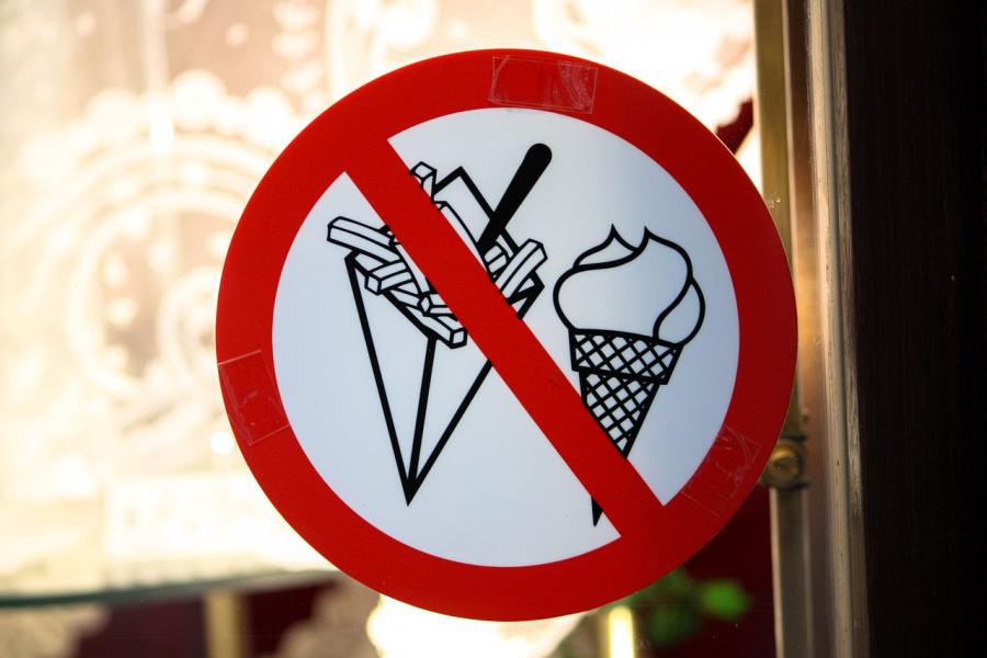 Prohibited sign featuring fried and ice cream