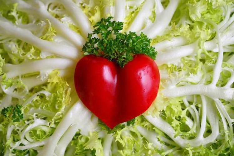 Leafy vegetable with veggie "heart" in center