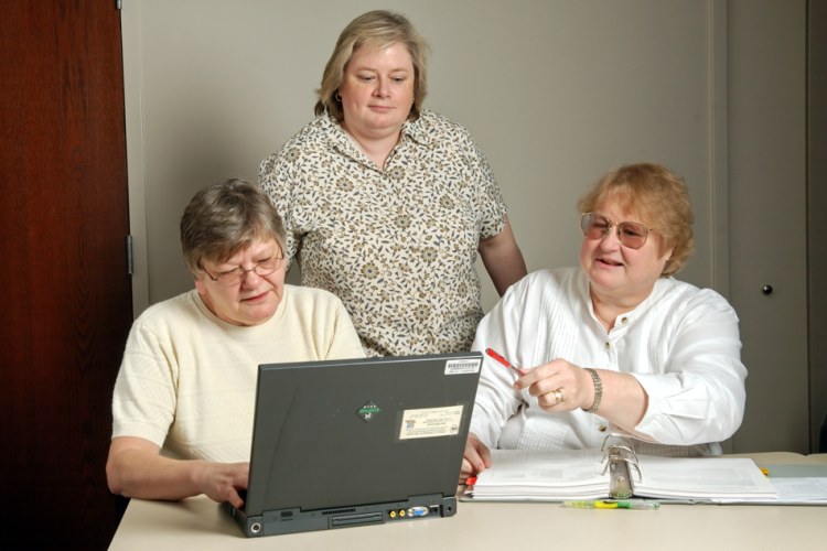 Three senior citizen women at work