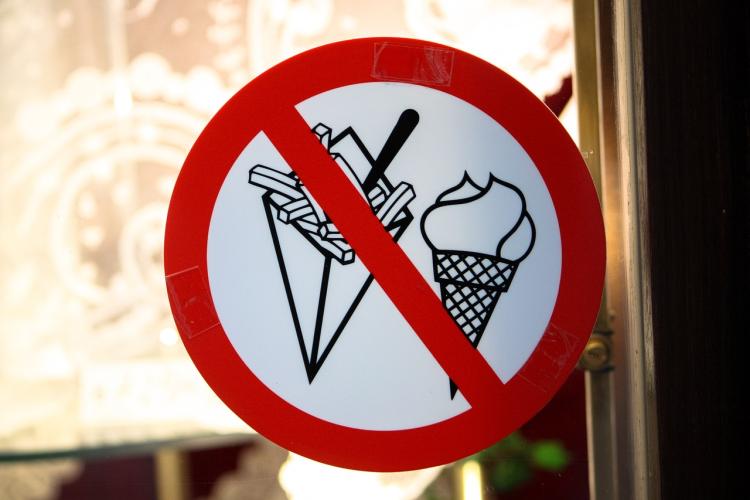 Prohibited sign featuring fried and ice cream