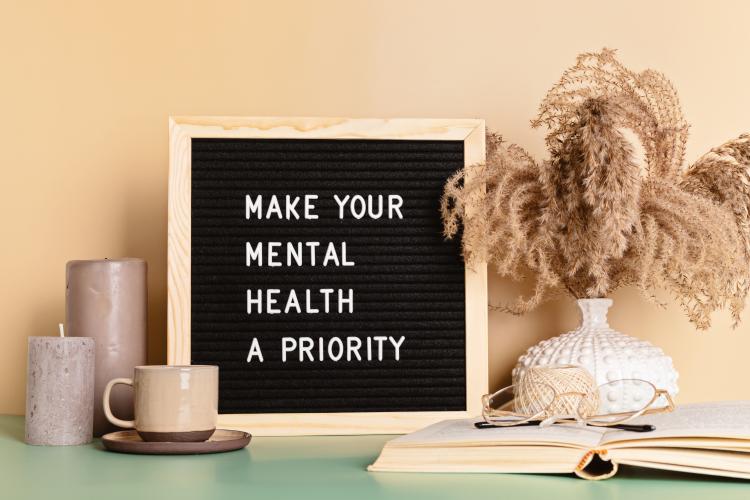 Board says, in CAPS, "make your mental health a priority"